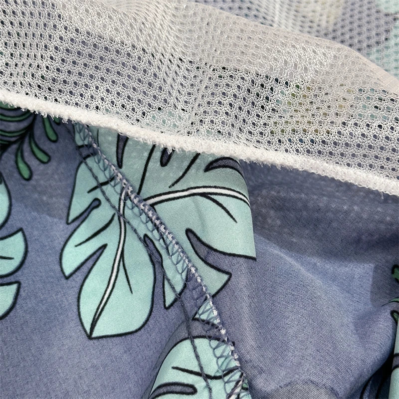 "Floral Leaves" Swim Trunks